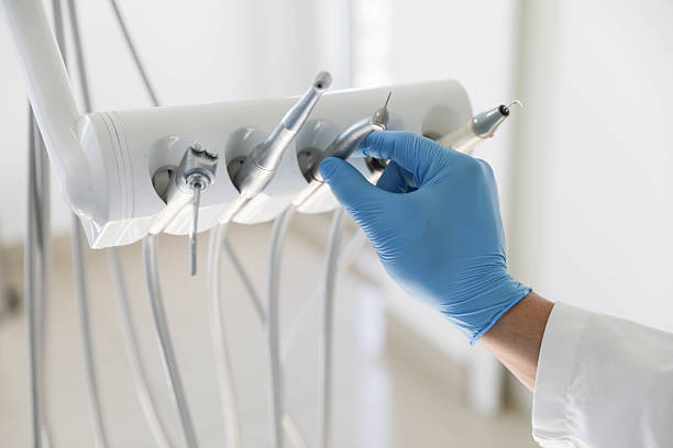 Professional Tooth Extraction technician working in Long Creek, IL